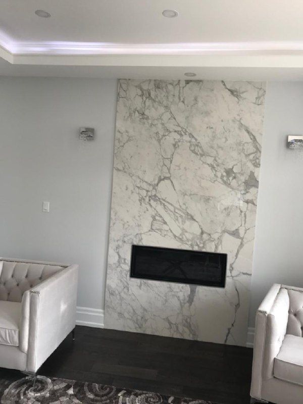 Statuario marble fireplace feature wall