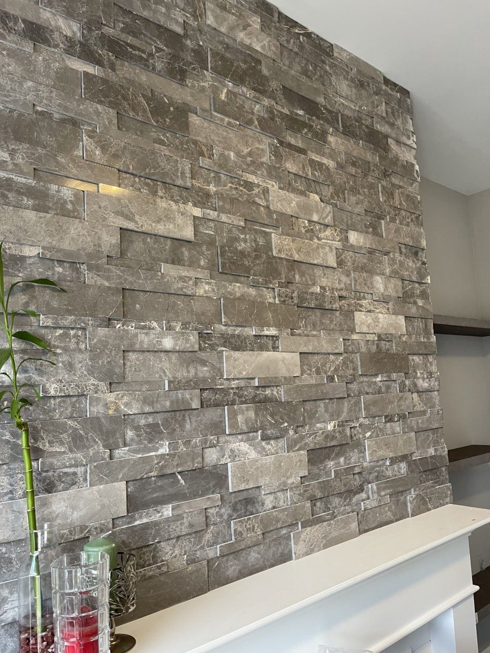 Split-face natural stone ledger feature wall