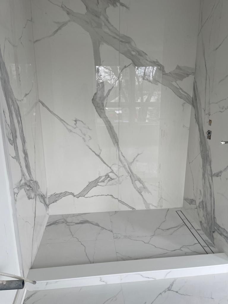 Statuario marble walk-in shower