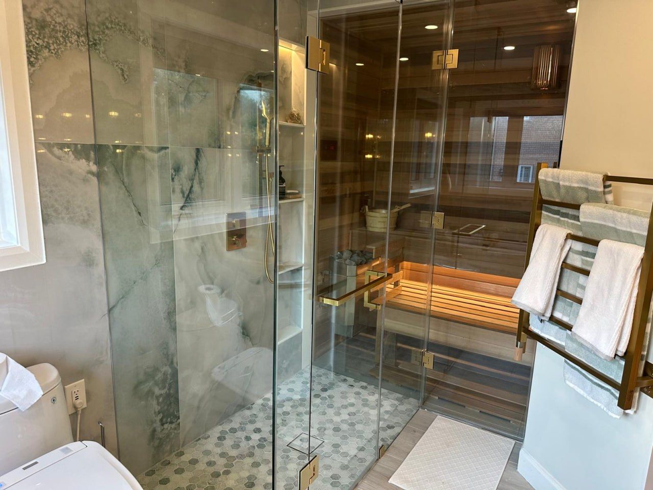 Steam shower and cedar sauna ensuite