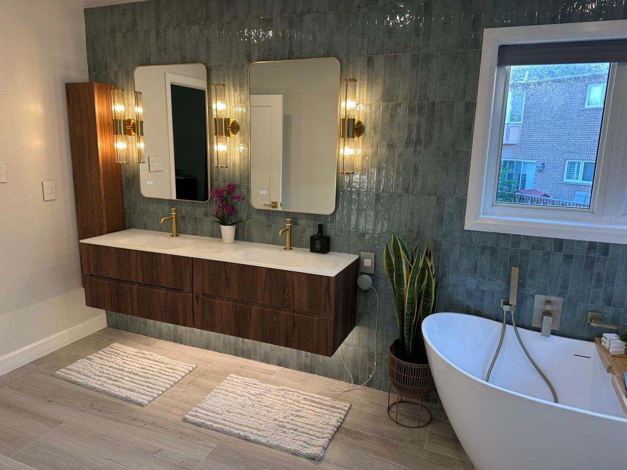 Green-tile double vanity with freestanding tub