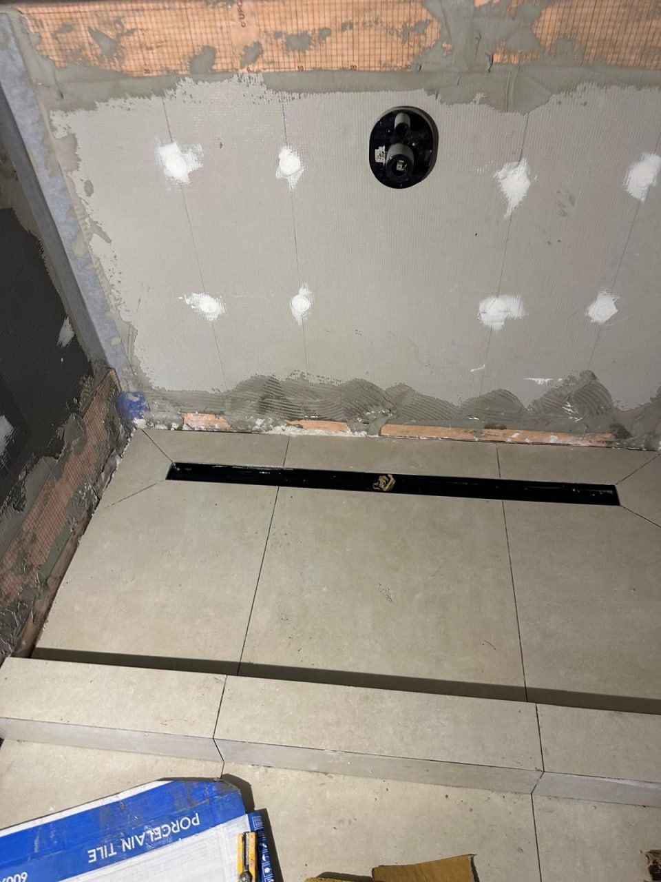 Waterproofing membrane and linear drain set in thinset