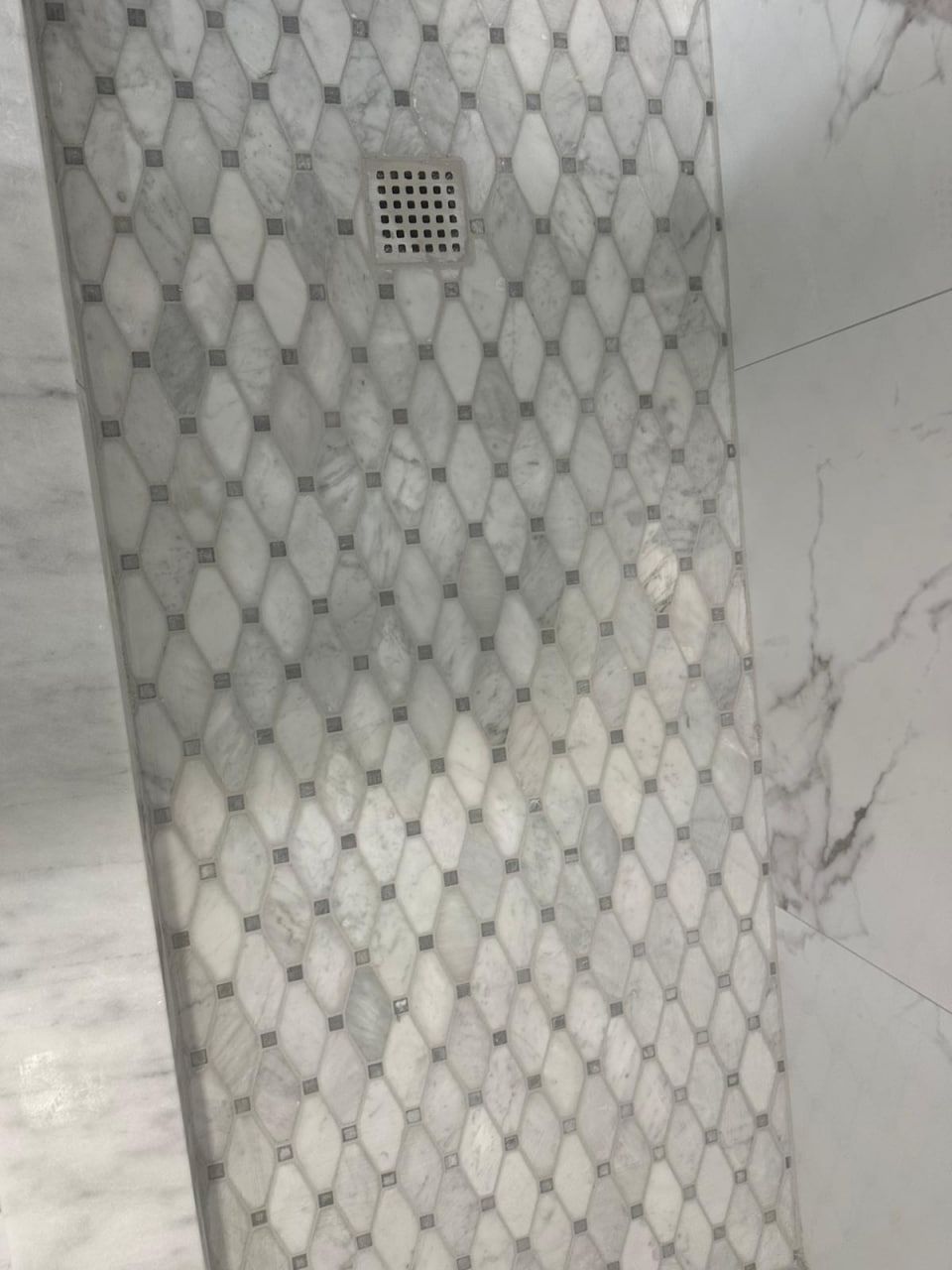 Diamond-cut marble mosaic shower pan
